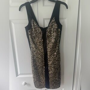 Jessica McClintock black and gold fitted mini.